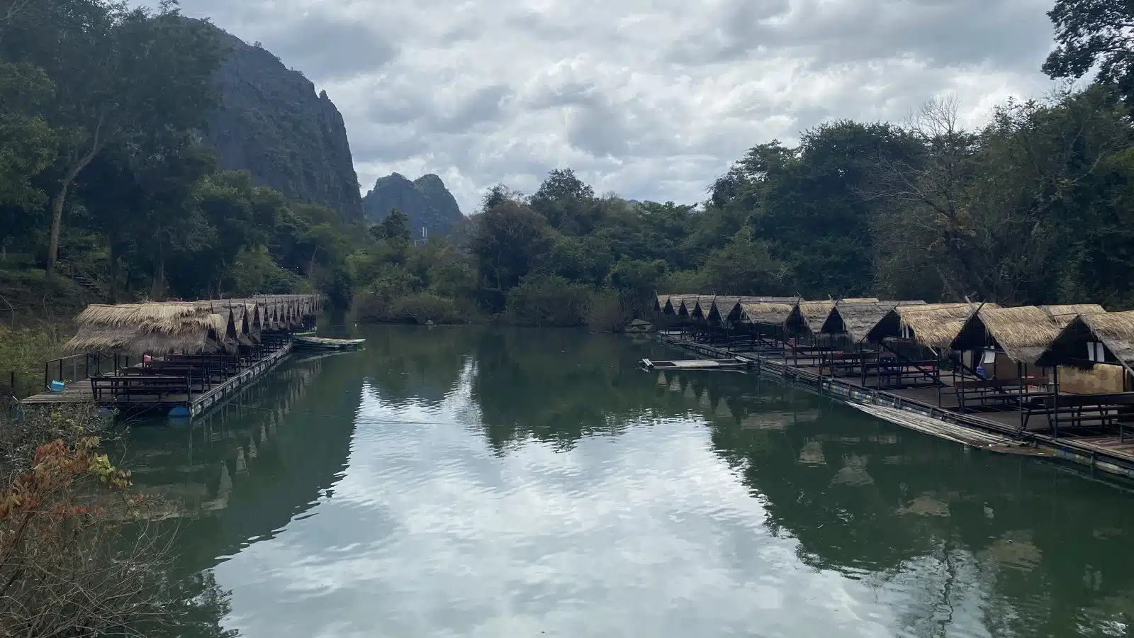 Tha Falang lagoon with floating huts on the Thakhek Loop